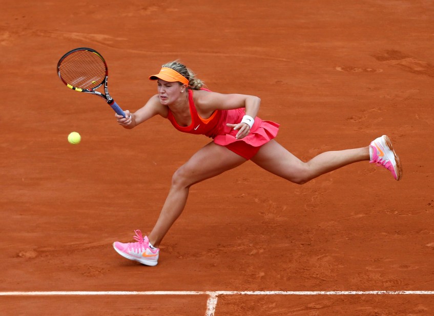 Bouchard affronte Carla Suarez Navarro lors des quarts de finale à Roland-Garros. (AP Photo/Darko Vojinovic).
