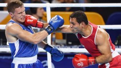 Samir El Mais (droite-rouge) a décroché l'or en boxe.)