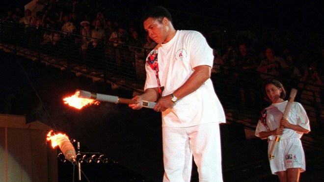 Muhammad Ali lights the Olympic flame in Atlanta on July 19, 2016. Muhammad Ali lights the Olympic flame in Atlanta on July 19, 2016.