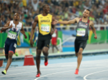 Usain Bolt et Andre De Grasse lors de la demi-finale du 100 m aux Jeux olympiques, le 14 août 2016