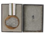 Médaille de bronze e nhockey masculin aux Jeux olympiques de 1992 à Albertville. (Photo : Hockeygods.com)