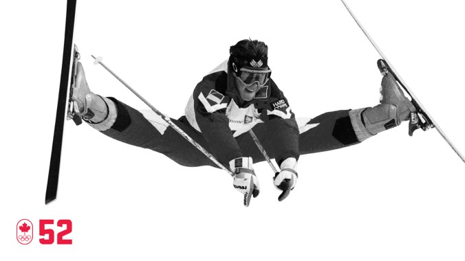 100 COUNTDOWN 52 À Lillehammer 1994, Jean-Luc Brassard a remporté la première médaille d'or olympique en ski acrobatique du Canada. Il a été un pionnier du sport non seulement par son mouvement signature, le Cossack, mais aussi avec ses appliqués colorés sur ses genoux pour mieux montrer la finesse de ses virages. SOIS EXCELLENT