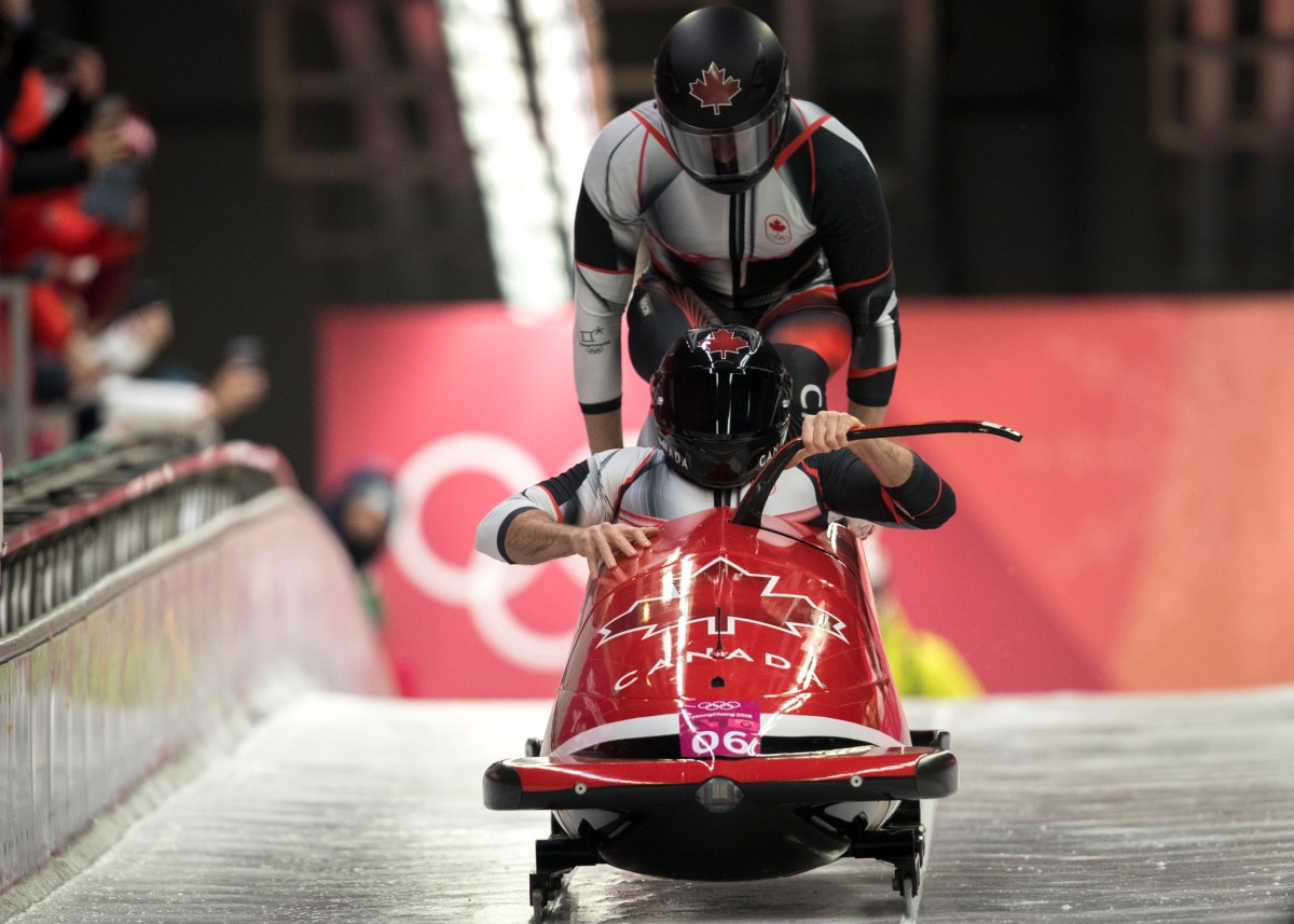 Justin Kripps et Alexander Kopacz remportent une médaille d'or en bob à deux. LA PRESSE CANADIENNE/HO - COC – David Jackson