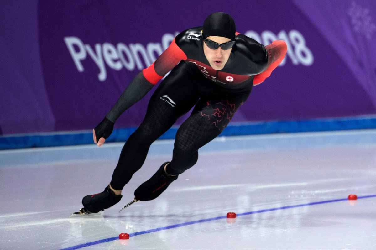 Denny Morrision patine au 1500m masculin. COC Photo/Jason Ransom