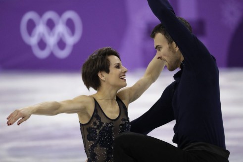 Pyeongchang Olympics Figure Skating Pairs Meagan Duhamel and Eric Radford of Canada perform in the pair skating short program team event at the 2018 Winter Olympics in Gangneung, South Korea, Friday, Feb. 9, 2018. (AP Photo/Bernat Armangue)