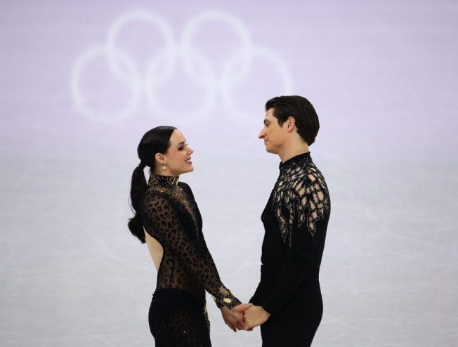 Equipe Canada - patinage artistique - Scott Moir et Tessa Virtue - pyeongchang 2018 Tessa Virtue et Scott Moir patinent leur programme court de danse sur glace aux Jeux olympiques de PyeongChang, le 19 février 2018. Photo COC/Vaughn Ridley