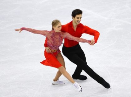 Equipe Canada-Patinage artistique - Kaitlyn Weaver et Andrew Poje- Pyeongchang 2018 Kaitlyn Weaver et Andrew Poje patinent leur programme court de danse sur glace aux Jeux olympiques de PyeongChang, le 19 février 2018. Photo COC/Vaughn Ridley