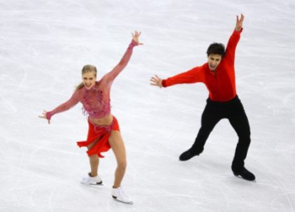 Equipe Canada-Patinage artistique - Kaitlyn Weaver et Andrew Poje- Pyeongchang 2018 Kaitlyn Weaver et Andrew Poje patinent leur programme court de danse sur glace aux Jeux olympiques de PyeongChang, le 19 février 2018. Photo COC/Vaughn Ridley