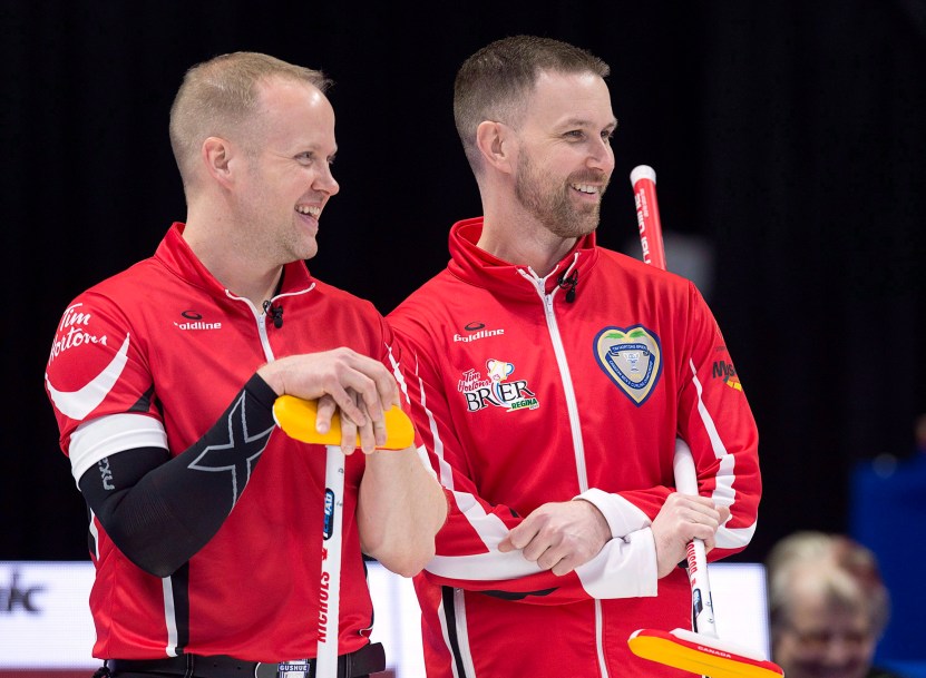 Brad Gushue and Mark Nichols en action