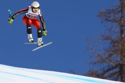 Roni Remme accélère sur le parcours de combiné alpin de la Coupe du monde de Crans-Montana, en Suisse, le 23 février 2019. (AP Photo/Marco Trovati)
