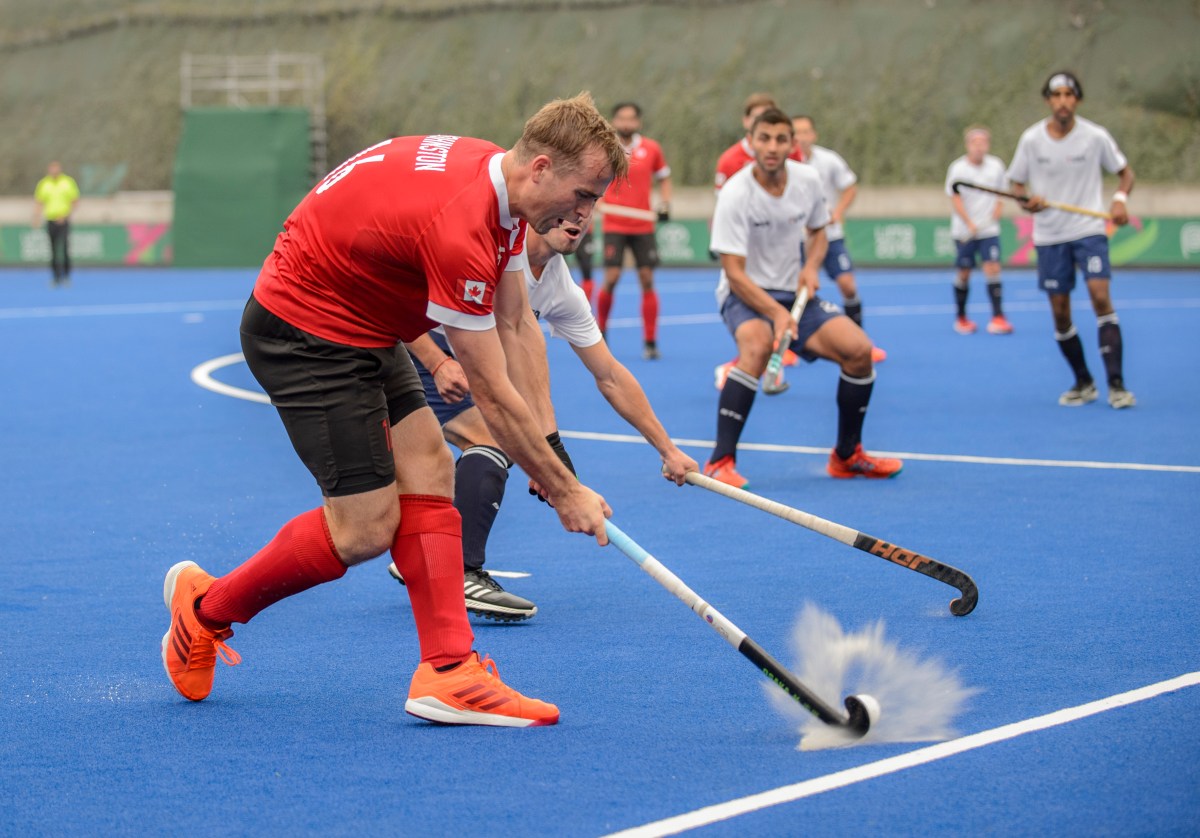 Gordon Johnston pendant un match de hockey sur gazon à Lima 2019