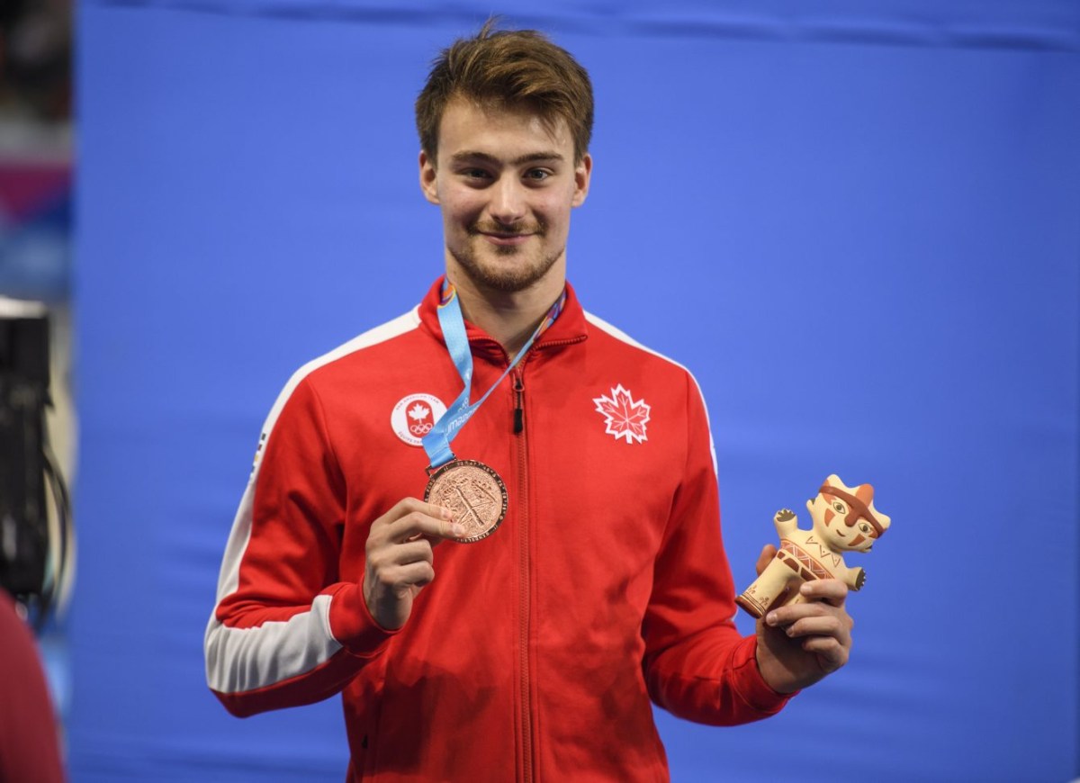 Philippe Gagné avec sa médaille de bronze de Lima 2019