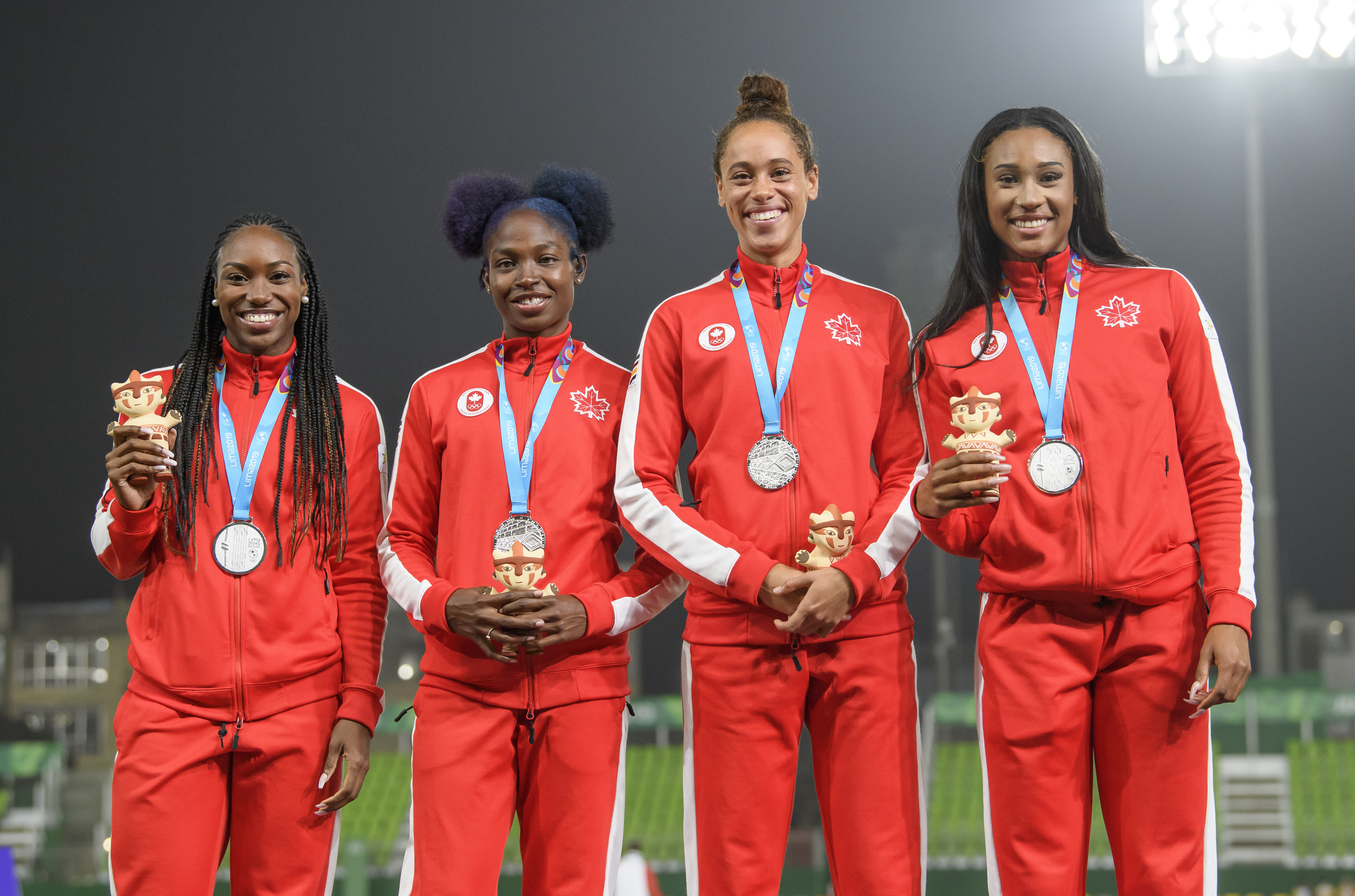 LIMA, Peru - Khamica Bingham, Crystal Emmanuel, Ashlan Best et Leya Buchanan ont remporté l'argent au relais 4 x 100 m aux Jeux panaméricains de Lima, au Pérou, le 10 août 2019. Photo : Christopher Morris/COC