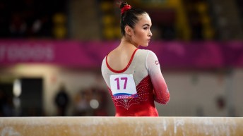 Victoria Woo se concentre avant de s'exécuter à la poutre aux Jeux panaméricains de Lima 2019