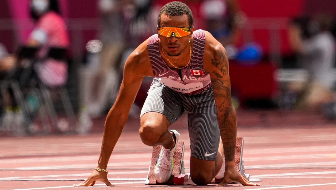 Andre De Grasse sur la ligne de départ.