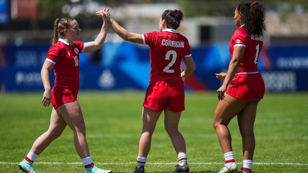 Eden Kilgour high fives her teammate