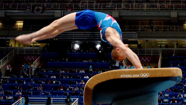 gymnast Kyle Shewfelt competing