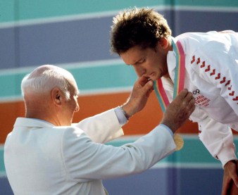 Alex Baumann receives the first of his two gold medals at the Los Angeles Games in 1984.
