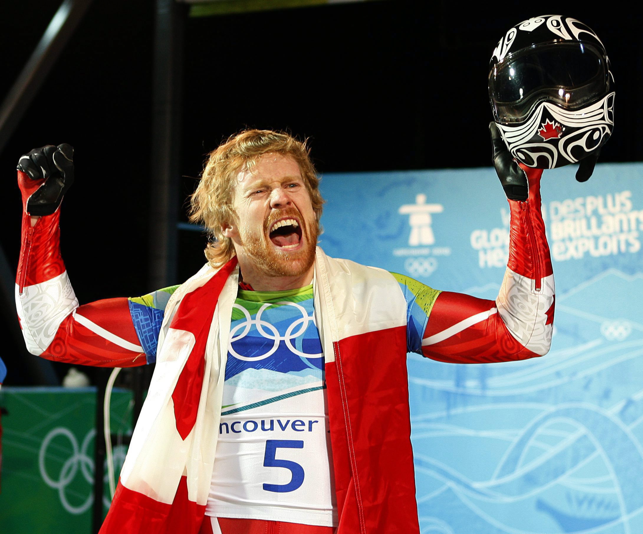 Canada's Jon Montgomery celebrates winning a gold medal in the men's skeleton competition at the Whistler Sliding Centre at the 2010 Vancouver Olympic Winter Games in Whistler, B.C., Friday, Feb. 19, 2010. THE CANADIAN PRESS/Jeff McIntosh