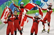 The Canadian men's short track speed skating team Olivier Jean, Guillaume Bastille, Charles Hamelin, Francois - Louis Tremblay and Francois Hamelin,left to right, celebrate their gold medal win February 26, 2010 in the mens's 5000 metre short track relay finals held at the Pacific Coliseum during the 2010 Vancouver Olympic Games. THE CANADIAN PRESS/Tara Walton