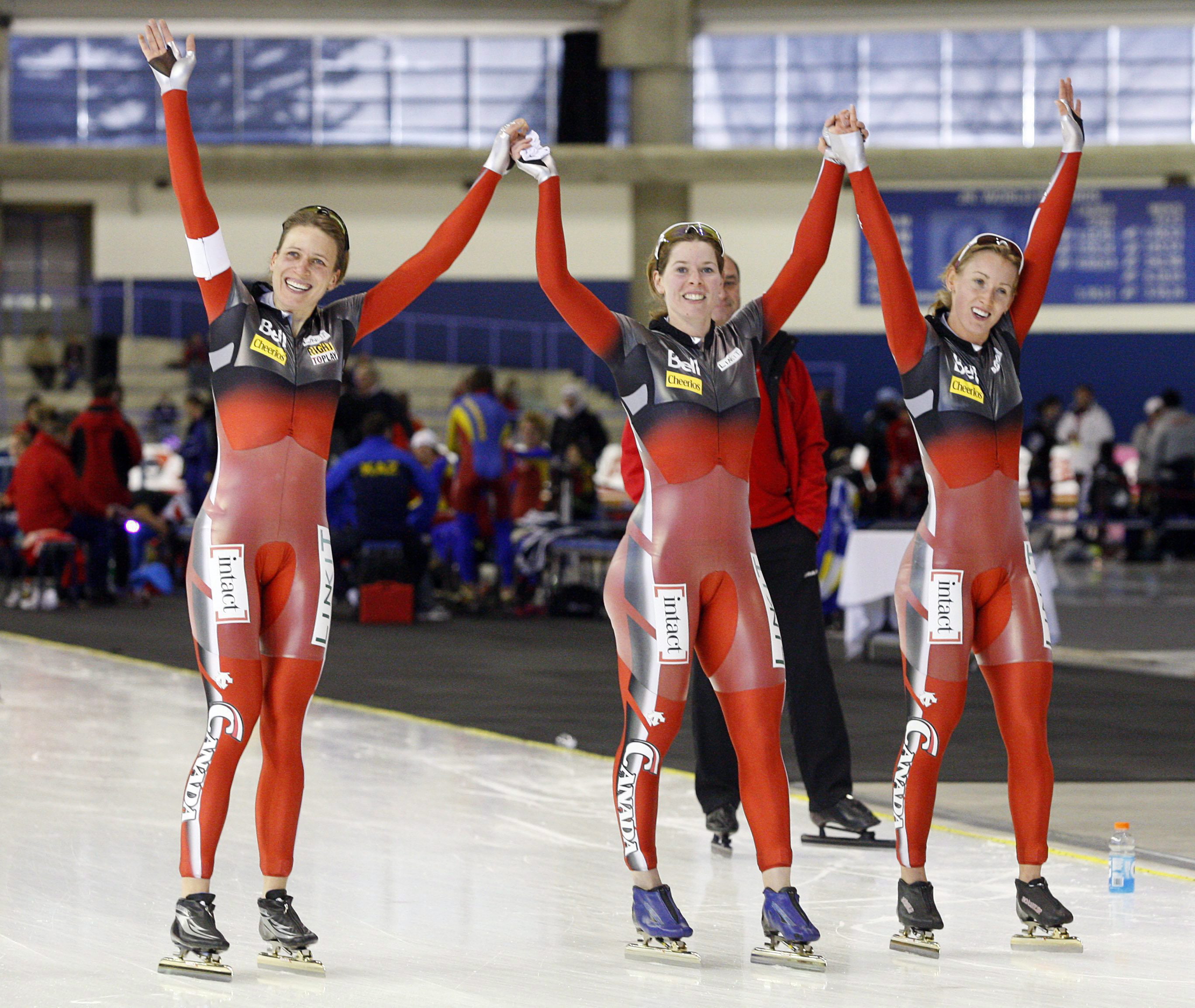 Brittany Schussler, Christine Nesbitt, Kristina Groves. Photo: Canadian Press