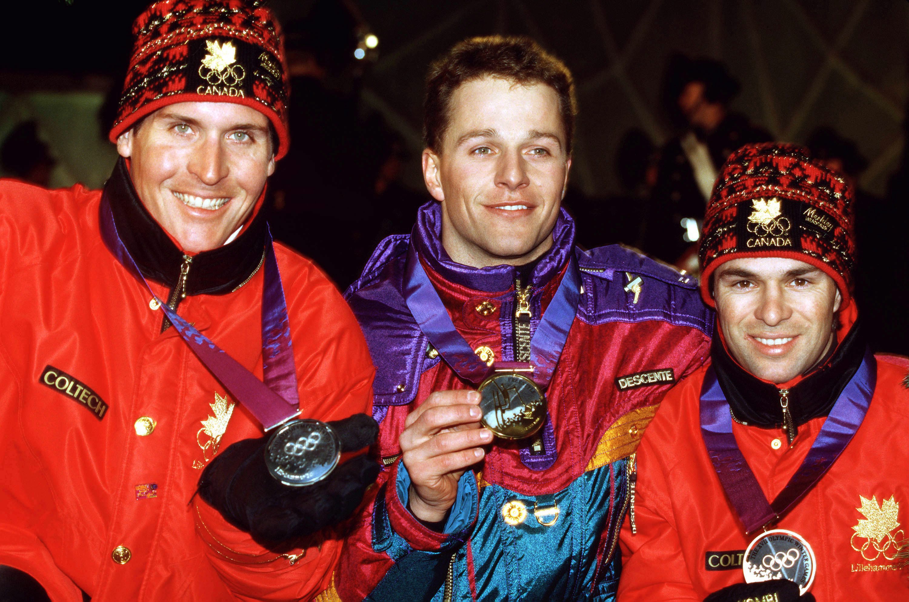 Canada's Philippe Laroche (left) and Lloyd Langlois (right) celebrate after winning respectively silver and bronze medals in the men's freestyle skiing aerials event at the Lillehammer 1994 Olympic Winter Games (CP Photo/ COC/Claus Andersen)