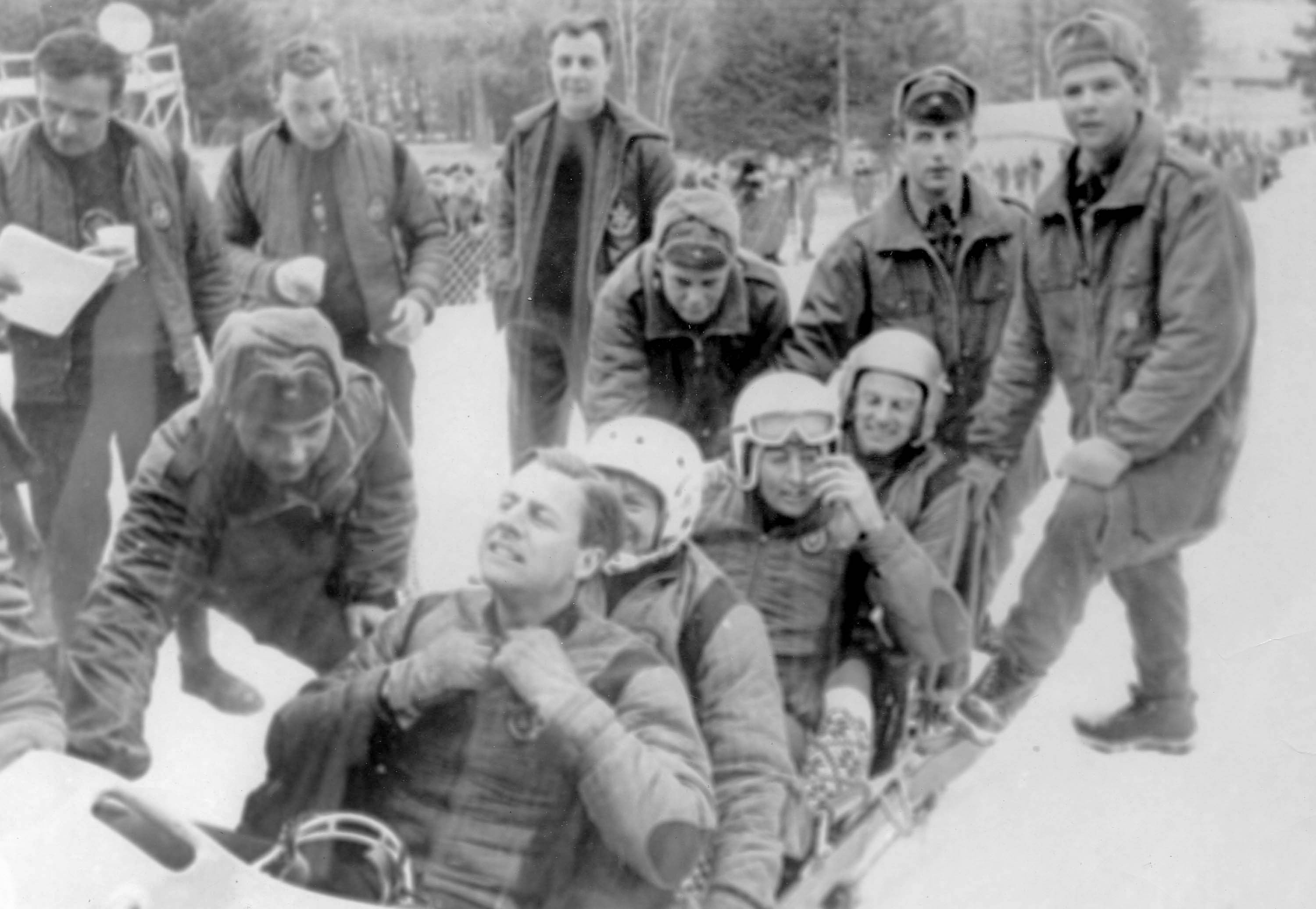 Black and white photo of bobsleigh crew