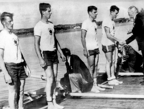 Canada's men's 4x rowing team celebrates its gold medal win at the 1956 Melbourne Olympics. (CP Photo/COC)
