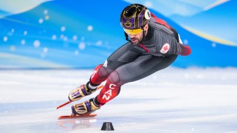 Charles Hamelin skates in a short track race