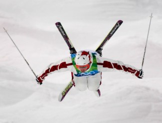 Alex Bilodeau of Rosemere, Que. looks for his jump landing during men's moguls training for the Olympic Winter Games at Cypress Mountain in Vancouver, B.C. (CP PHOTO)(HO-COC-Mike Ridewood)