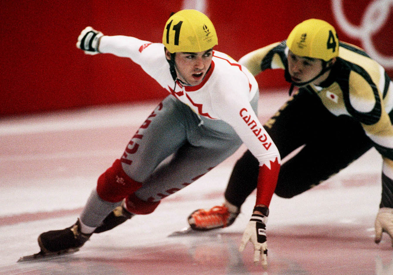 Canada's Frederic Blackburn (left) competing in the short track speed skating event at the Albertville 1992 Olympic Winter Games. (CP PHOTO/COC/Ted Grant)