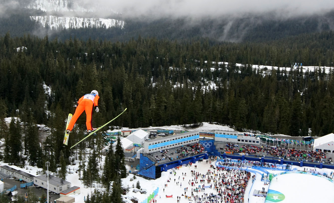 Wide shot of Jason Myslicki ski jumping