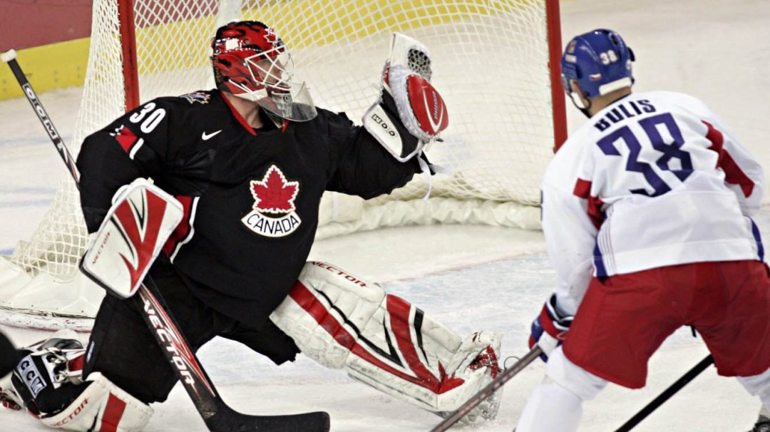 Team Canada goaltender Martin Brodeur makes a glove save