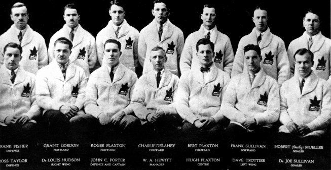 Hockey Team The University of Toronto Graduates, representing Canada, participate at the St. Moritz 1928 Olympic Winter Games. From left (top), Frank Fisher, Grant Gordon, Roger Plaxton, Charlie Delahey, Bert Plaxton, Frank Sullivan,Norbert "Stuffy" Mueller, (bottom) Ross Taylor, Dr. Louis Hudson, John C. Porter, COCch Mgr. W.A. Hewitt, Hugh Plaxton, Dave Trottier and Dr. Joe Sullivan. (CP Photo/COC)