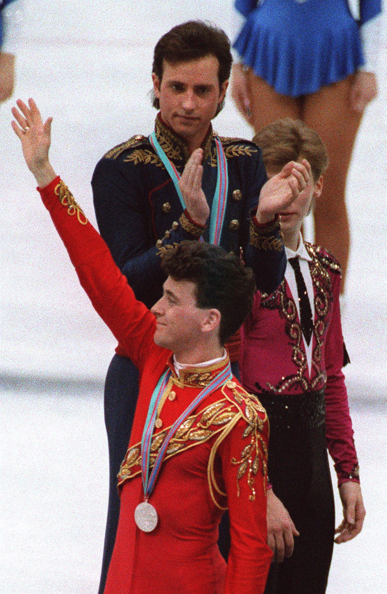 Brian Orser waves as Brian Boitano applauds the silver medallist at Calgary 1988.