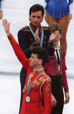 Battle of the Brian's Brian Orser waves as Brian Boitano applauds the silver medallist at Calgary 1988.