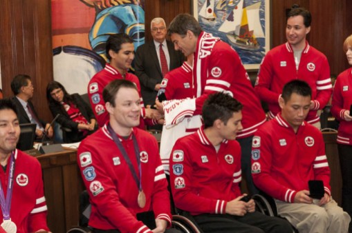 Mayor Robertson & athletes COC photo by Bayne Stanley
