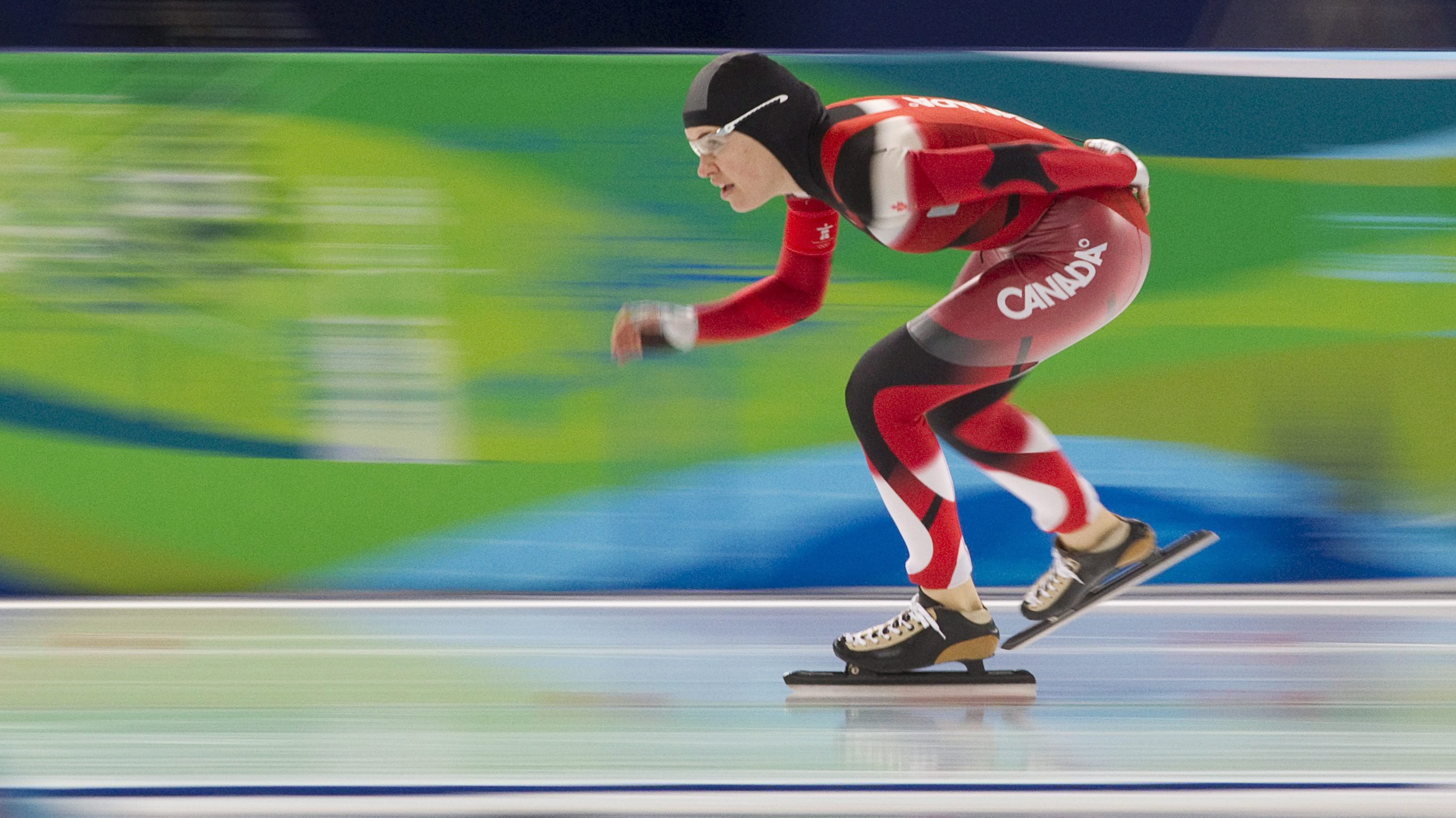 Canadian speed skater Clara Hughes races to bronze in the women's 5000m event at the XXI Olympic Winter Games in Richmond, B.C., Wednesday Feb. 24, 2010. THE CANADIAN PRESS/Adrian Wyld