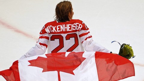OLY Women's Hockey 20100225 topix Team Canada captain Hayley Wickenheiser skates with the flag after winning the gold medal in women's Olympic hockey at Canada Hockey Place Thursday Feb. 25, 2010 at the 2010 Vancouver Olympic Winter Games in. THE CANADIAN PRESS/Scott Gardner