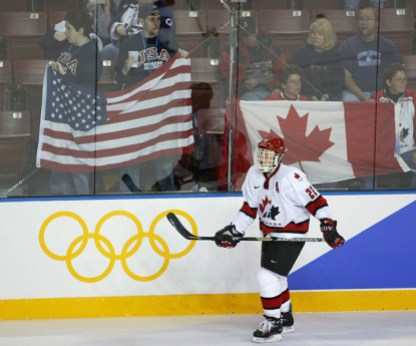 WICKENHEISER Canada's Hayley Wickenheiser, of Shaunavon, Sask., skates past US and Canadian fans during the warm-up prior to the gold medal ladies hockey game at the Olympic Winter Games in Salt Lake City, Utah, Thursday Feb. 21, 2002. (CP PHOTO/Paul Chiasson)