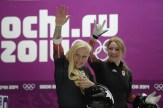 Kaillie Humphries and Heather Moyse waving
