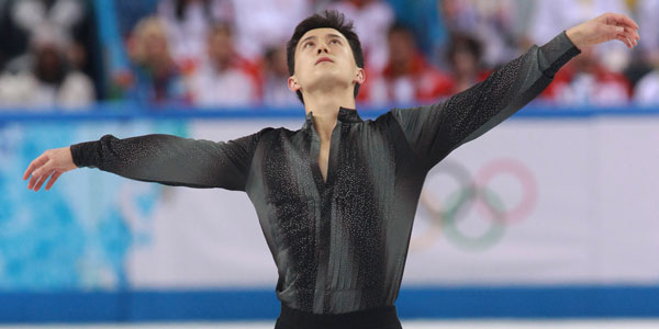Patrick Chan of Canada competes in the men's short program figure skating competition at the Iceberg Skating Palace during the 2014 Winter Olympics, Thursday, Feb. 13, 2014, in Sochi, Russia. (AP Photo/Darron Cummings)