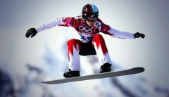 Dominique Maltais grabs air en route to a silver medal at Sochi 2014. (Photo: Canadian Press)