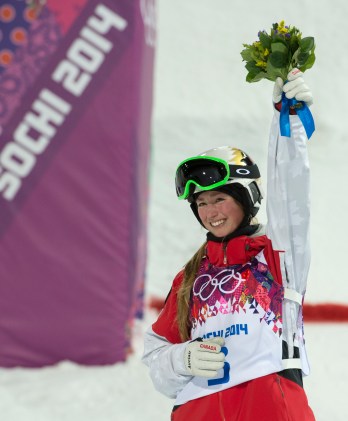 Chloe is on the podium to receive her silver medal.