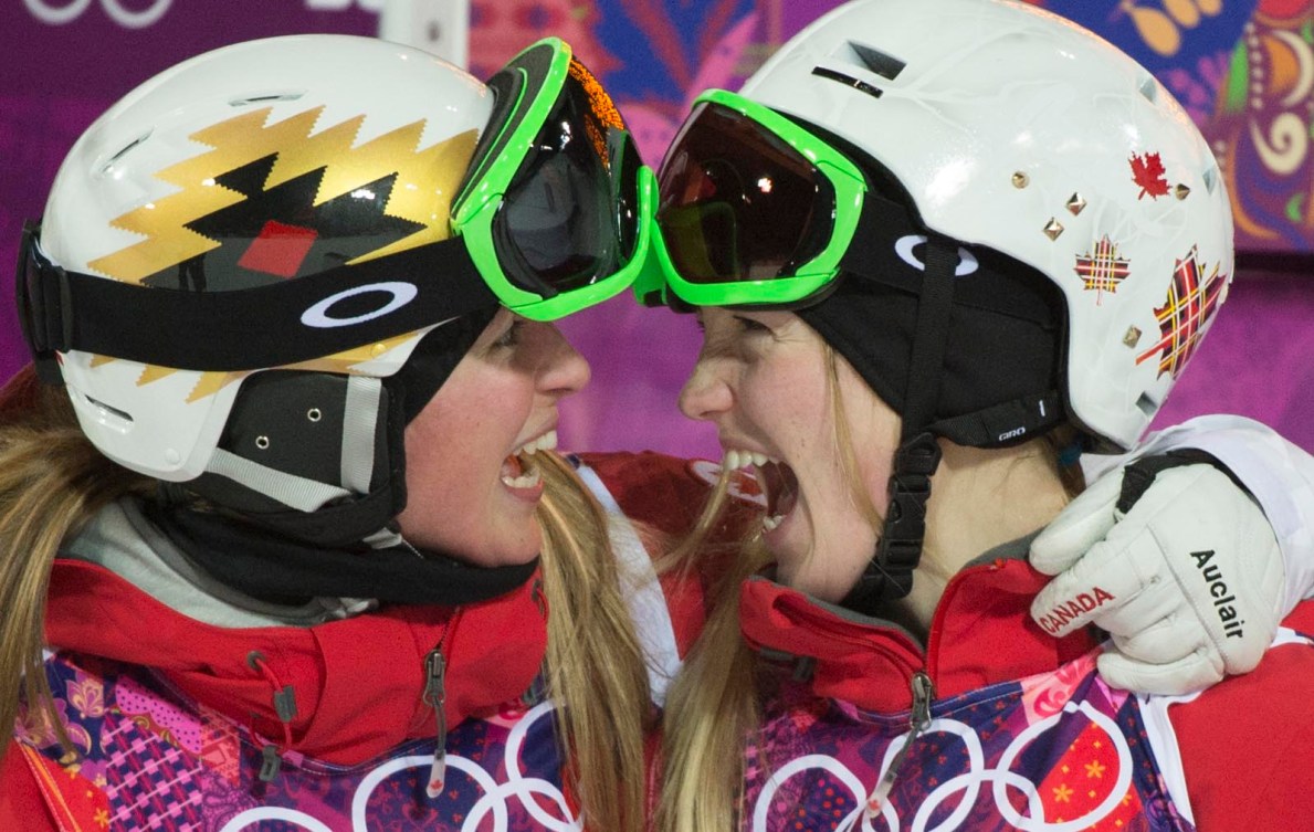 Justine Dufour-Lapointe & Chloe Dufour-Lapointe smiling at each other