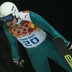 An athlete competing in ski jump