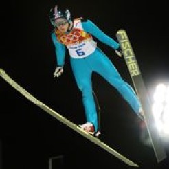 An athlete competing in ski jump