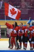 Team Canada celebrates beating Team USA in the gold medal women's hockey match