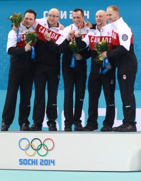 Men's Canadian curling team on the podium