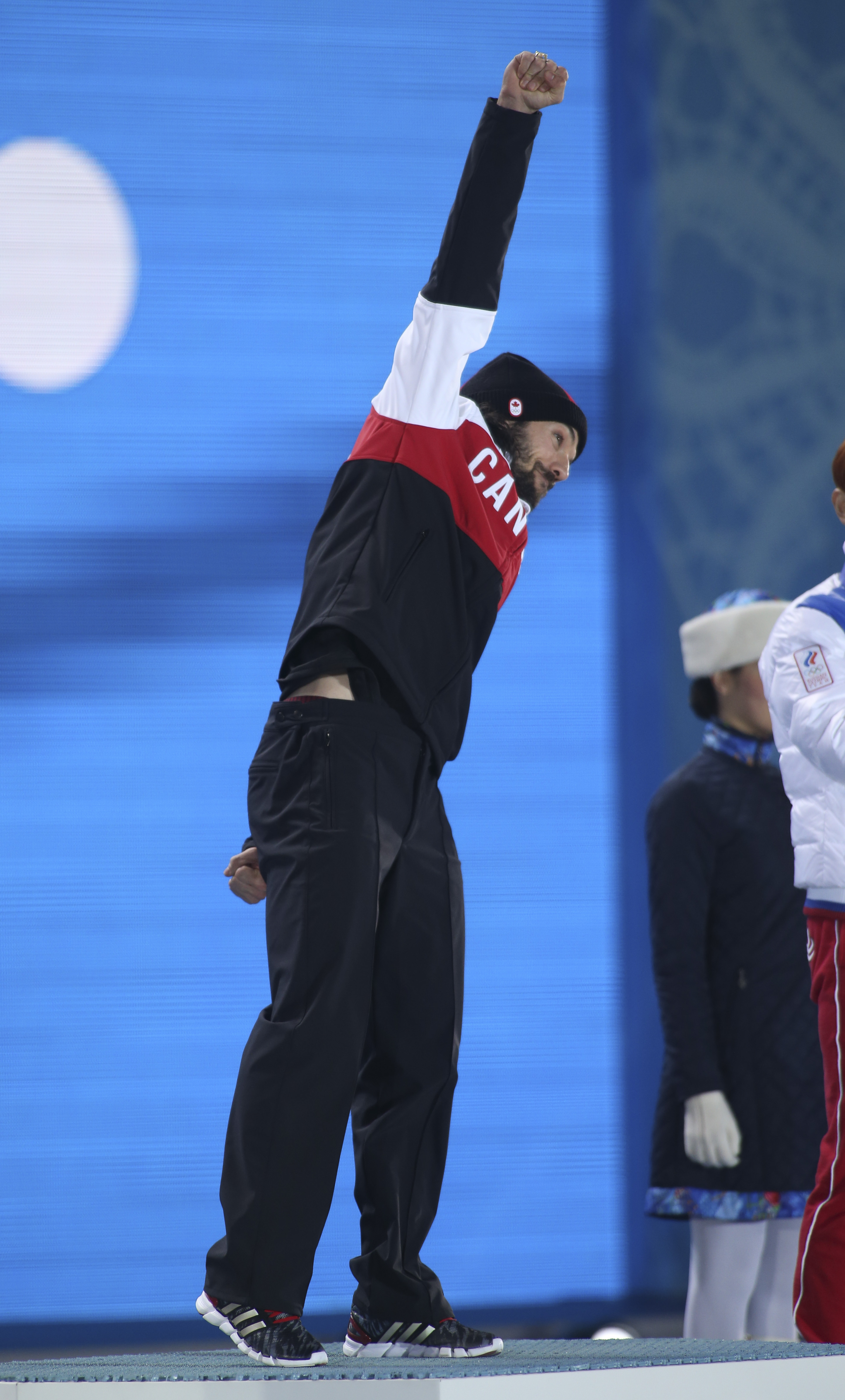 Charles Hamelin receives his gold medal in men's 1500 metre short track